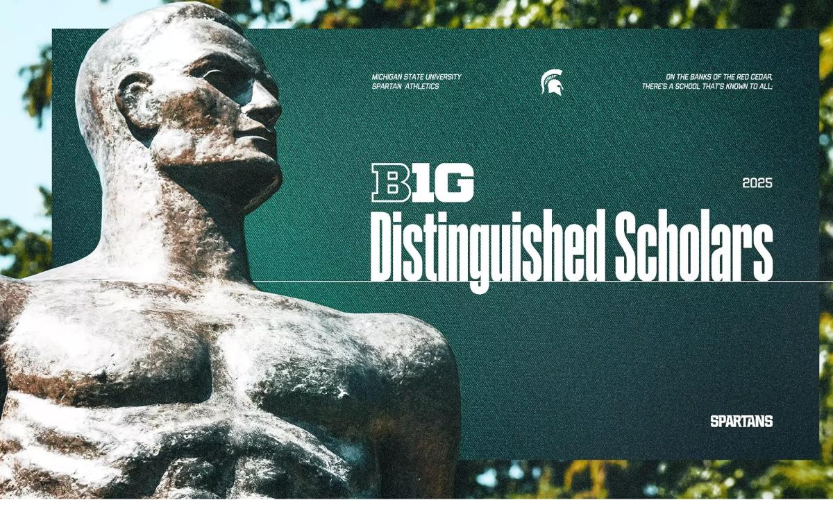 Spartan statue next to a green panel reading ?B1G Distinguished Scholars 2025? with Michigan State University Spartan Athletics text and a Red Cedar tagline.