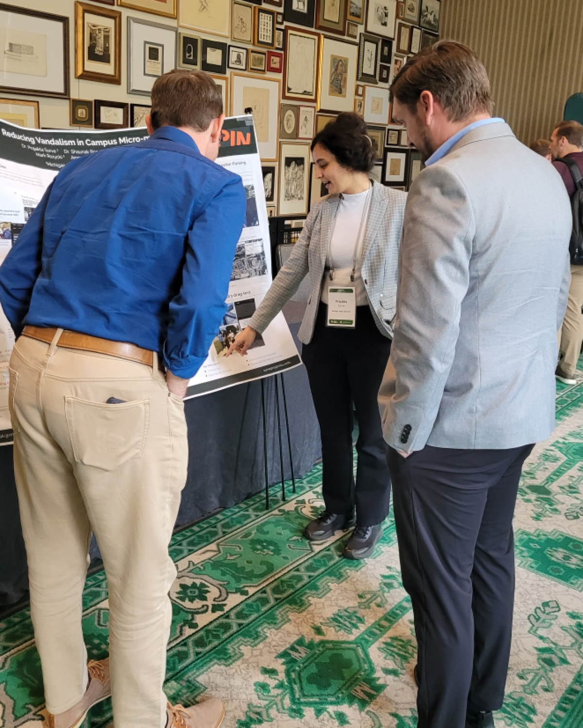 Person presenting poster at the Innovation Showcase