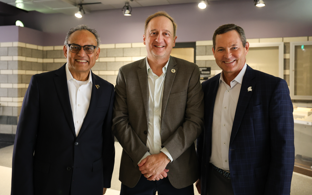 Green and White Co-Chair Sanjay Gupta, College of Engineering Interim Dean John Papapolymerou, and Green and White Co-Chair Matt Elliott