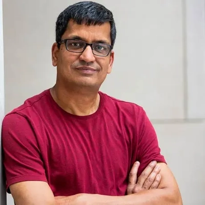 Professional headshot of Rajendar Deora