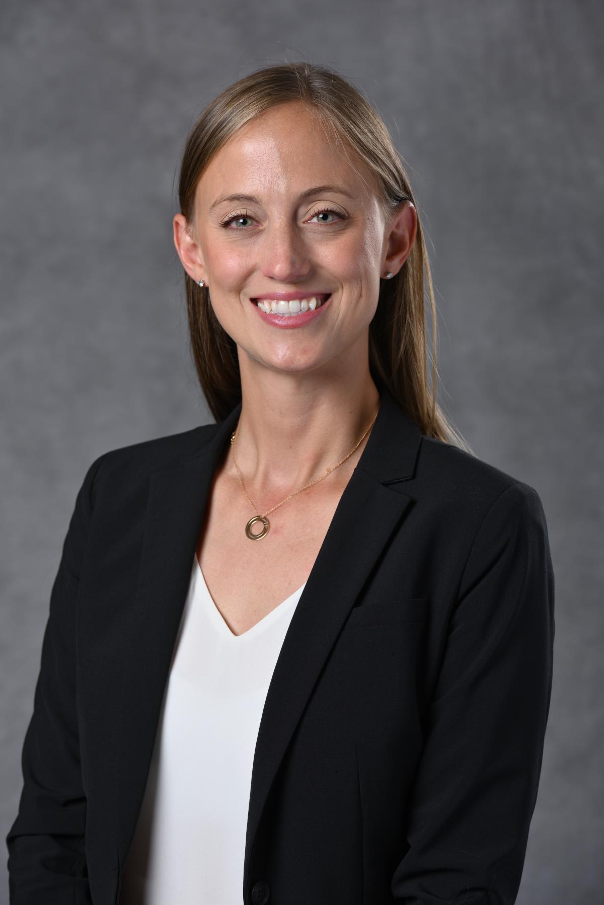 Professional headshot of Maggie Williams