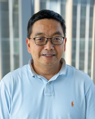 Professional headshot of Xuefei Huang