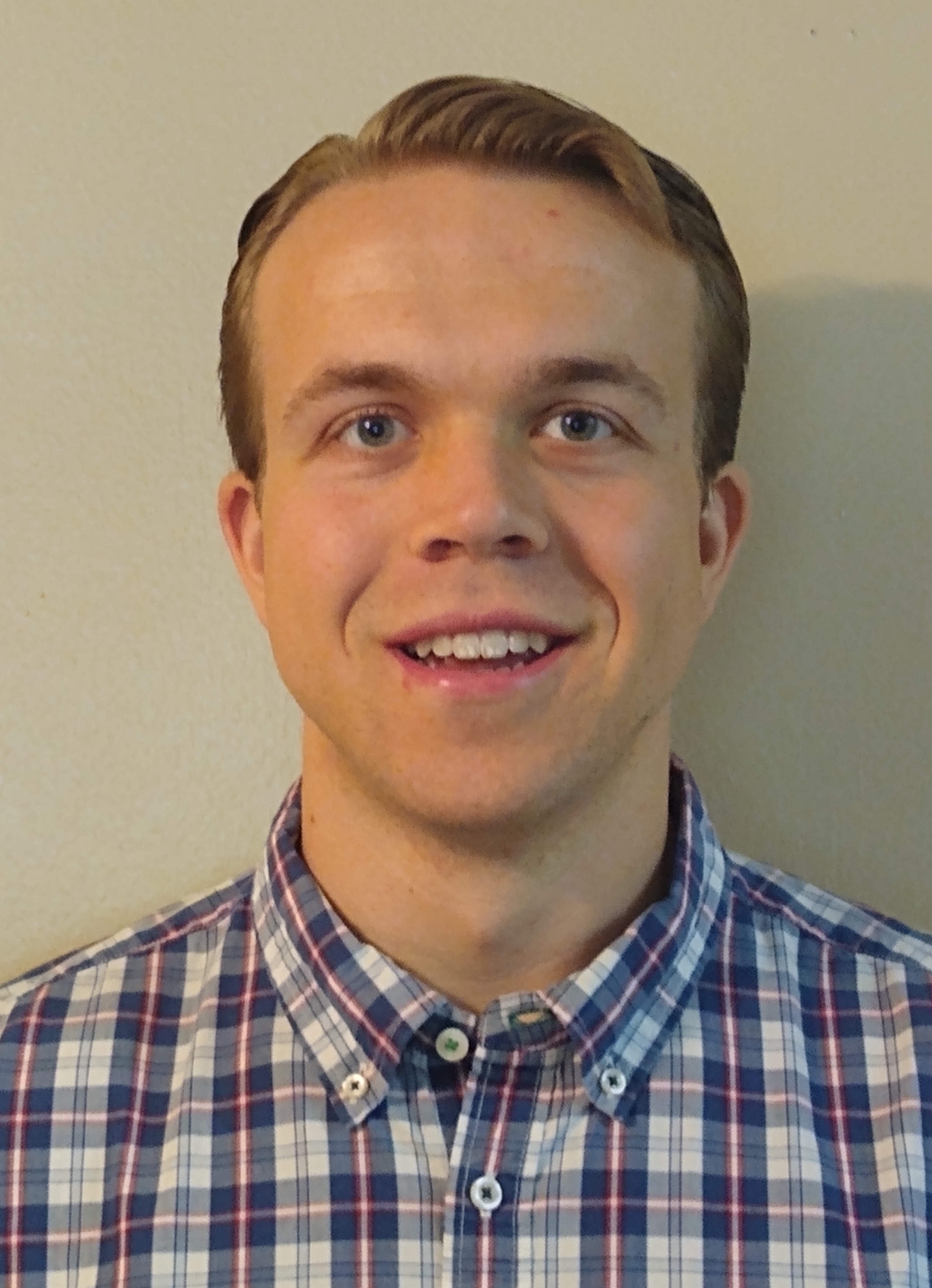 Headshot of Neil Filosa.