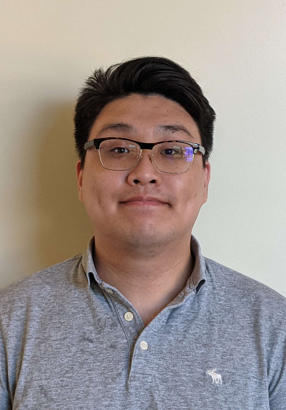 Headshot of Yi Wang. 