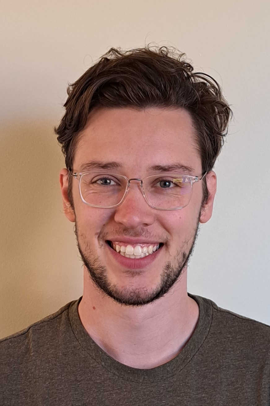 Headshot of John Dockerty.