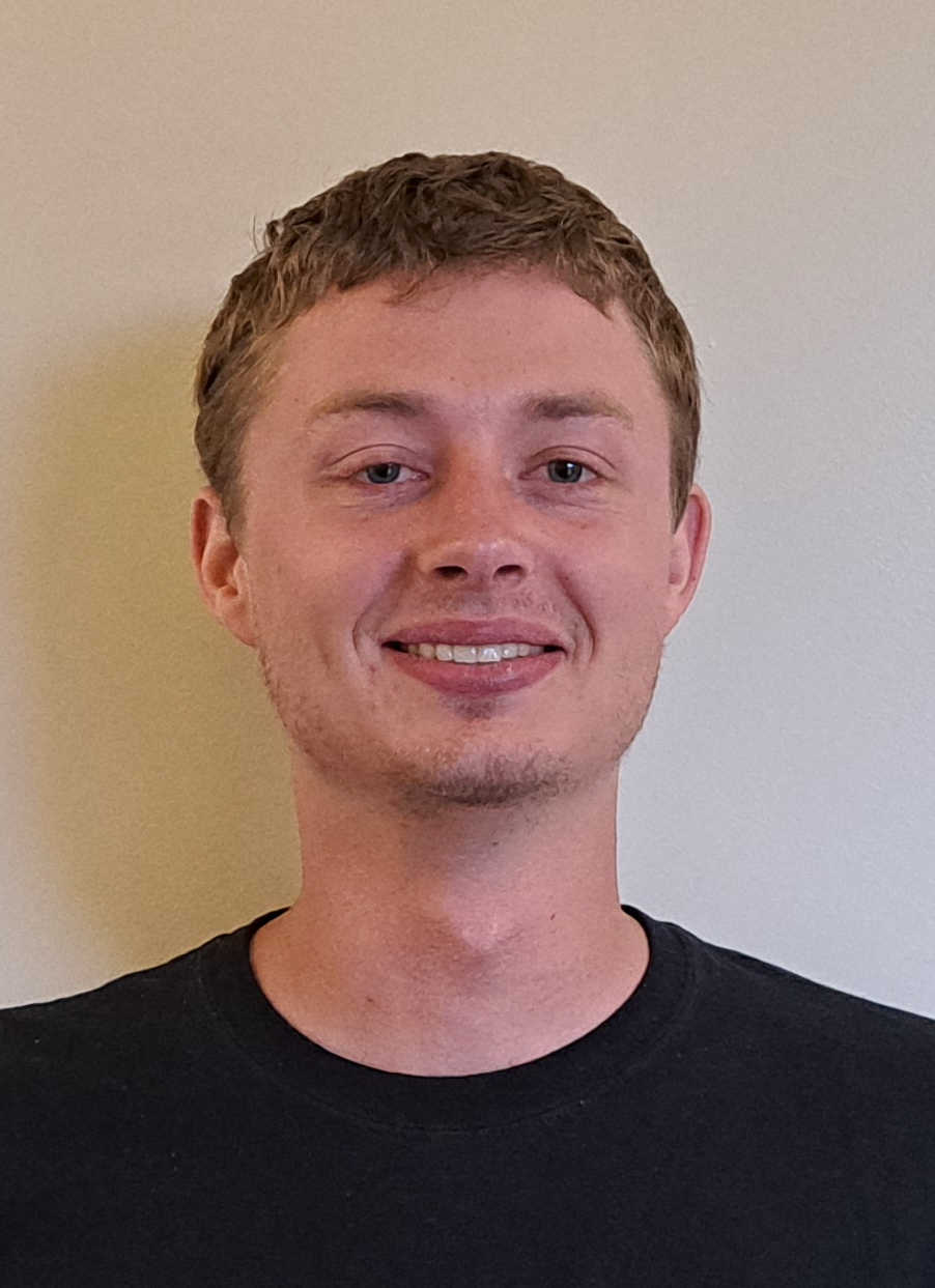 Headshot of Nicholas Sweeney.