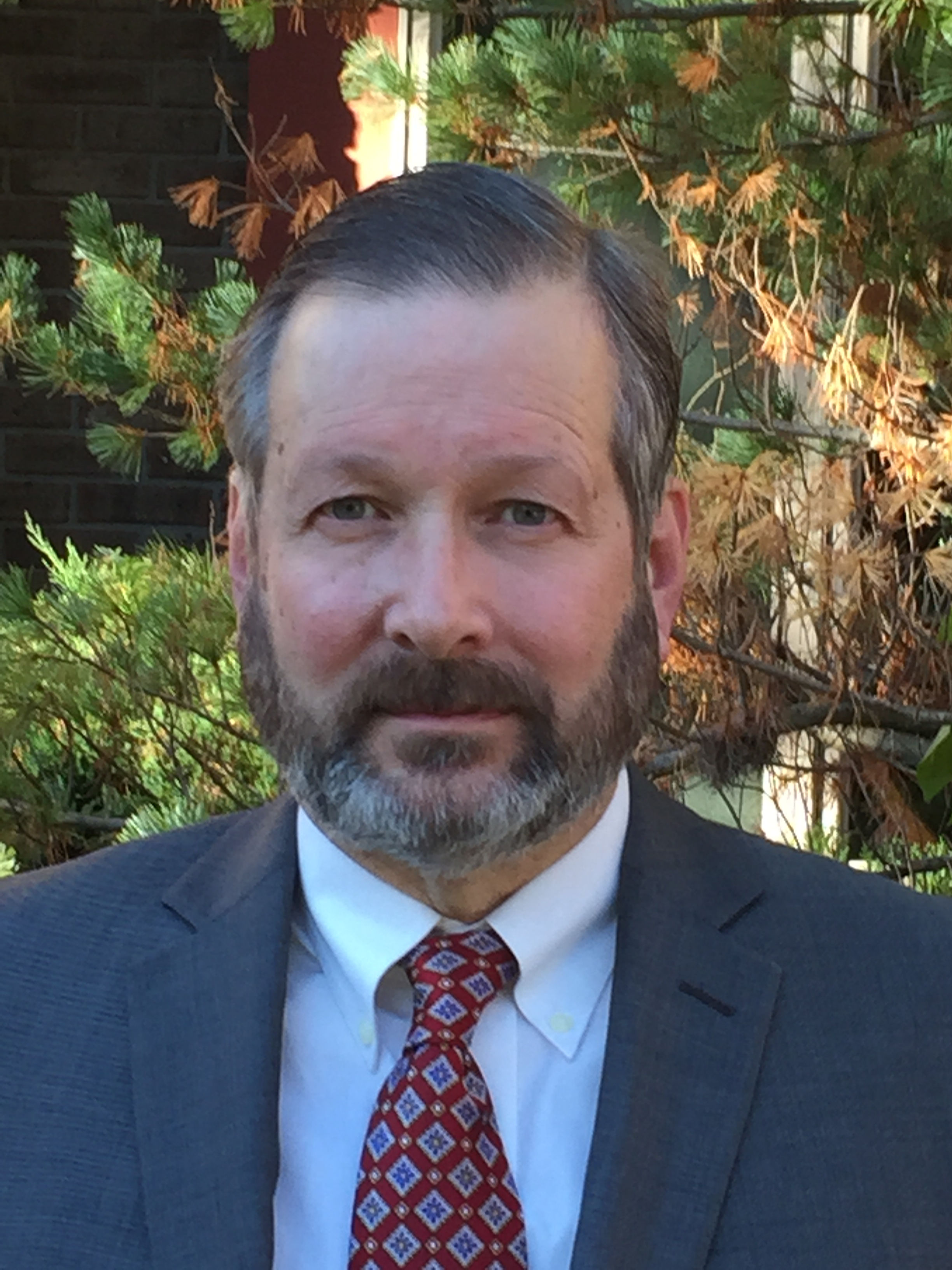 Headshot of John Wilson.