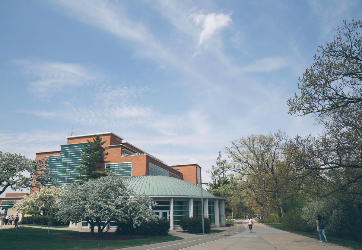 External view of Erickson Hall KIVA with magnolia trees in bloom
