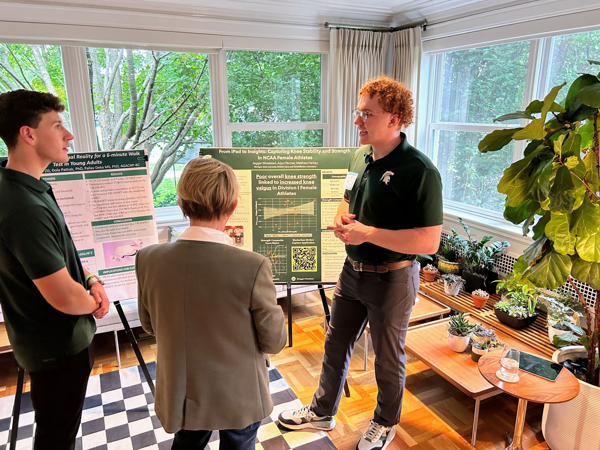 Jagger Wraalstad presents research at the MSU Cowles House in 2025.
