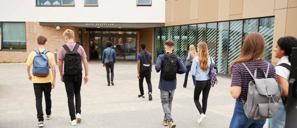 students walking inside a school