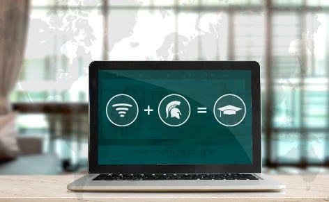 Laptop, with a graphic on the screen that includes WiFi signal, a Spartan helmet and a graduation cap.