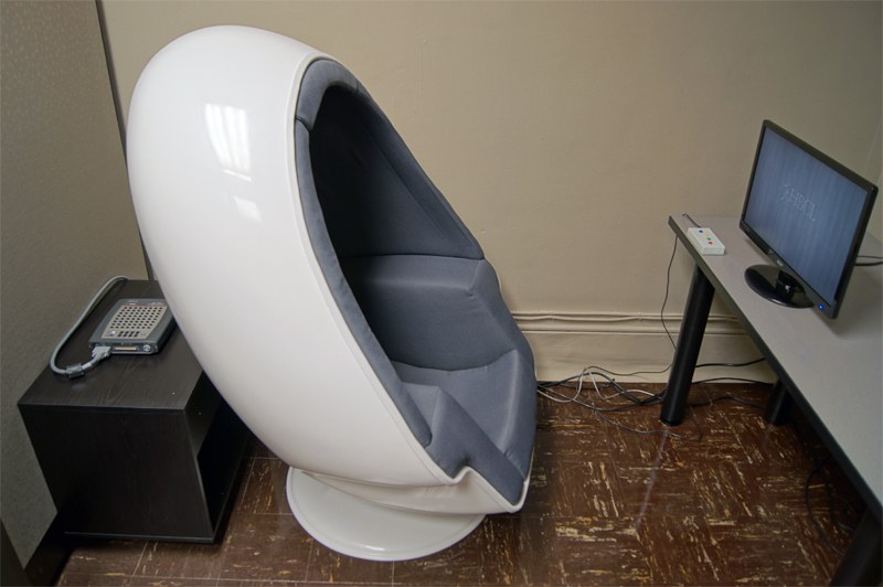 Neuroelectric Assessment Chamber with Inmod ModPod Egg Chair and Neuroscan SynampsRT 64 Channel EEG Amplifier.