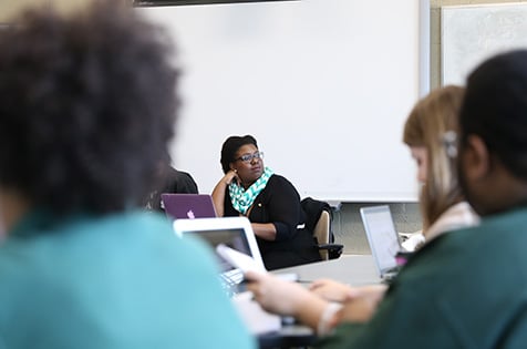 graduate students on computers