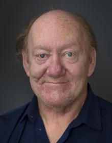 Headshot of Phillip Baumgarner.