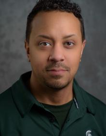 Headshot of Tim Evans.