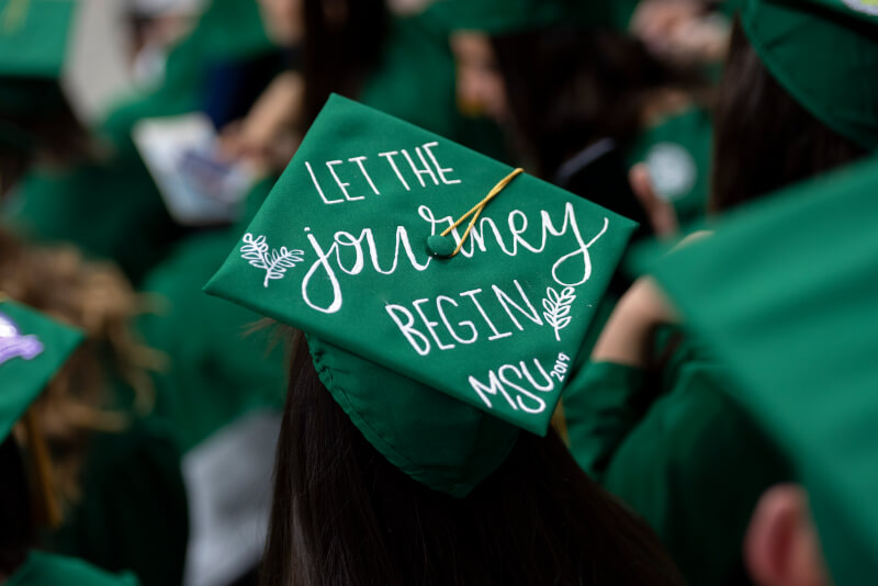 A green MSU graduation cap. 