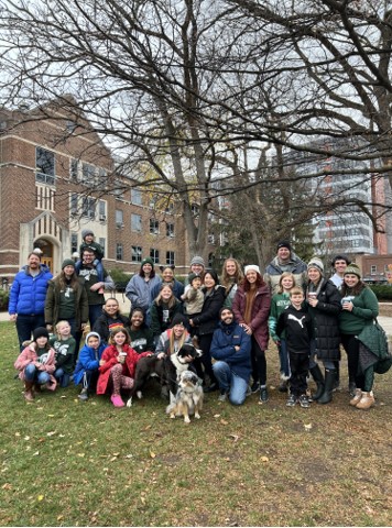 Graduate students at a tailgate.
