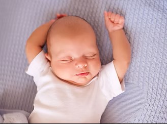 A 3 month old baby.