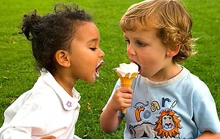 Three year olds eating ice cream.