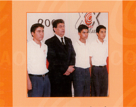 Photo of Jose Mendoza with the president of Mexico on the back cover of a high school textbook
