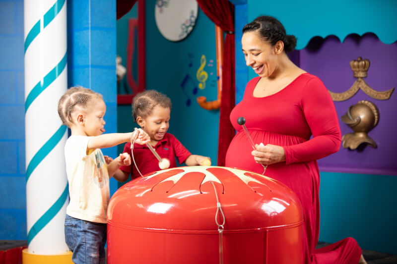 woman playing with children