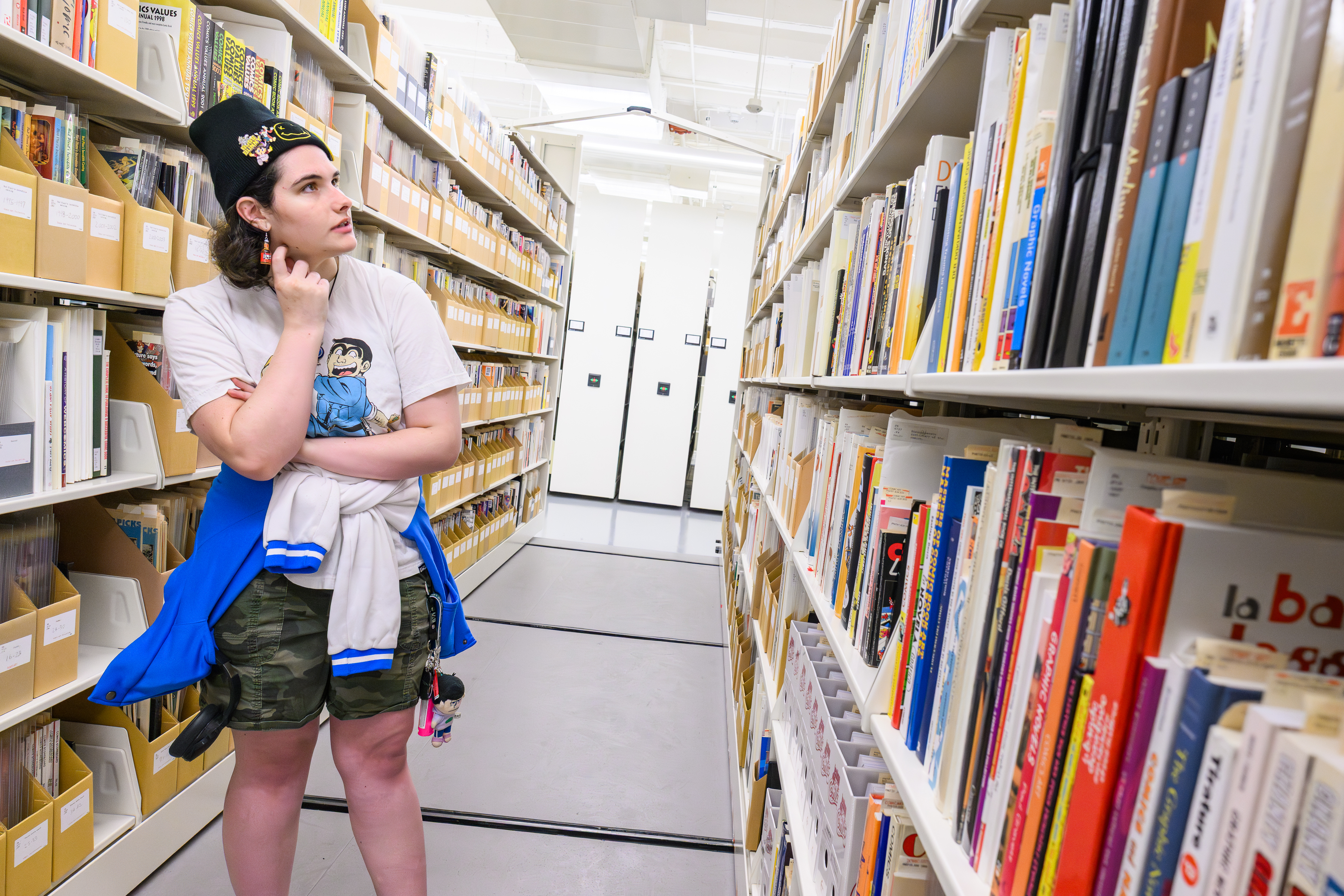 Spartan student Addyson Richard examines a shelf in the MSU Libraries Special Collections.