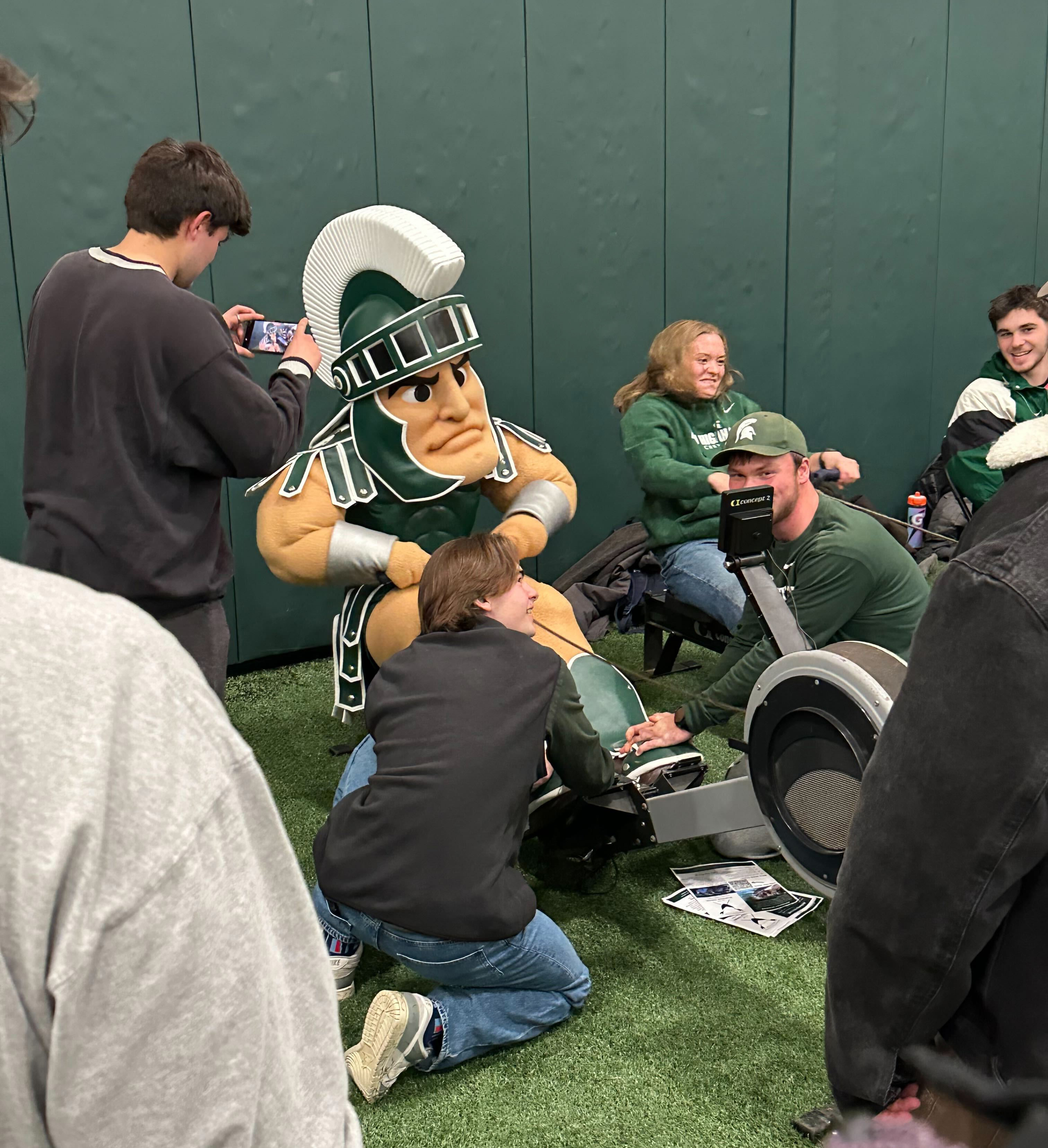 Sparty uses one of the MSU Crew Club's rowing machines.