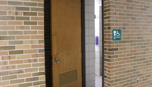 The outer door of an all-gender bathroom on MSU's campus.
