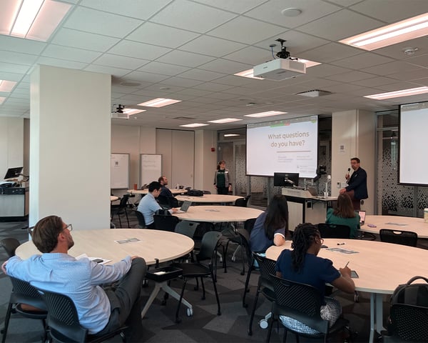 Attendees sitting at circle tables during the Center for Teaching & Learning Innovation Instructor Jumpstart Hybrid workshop.