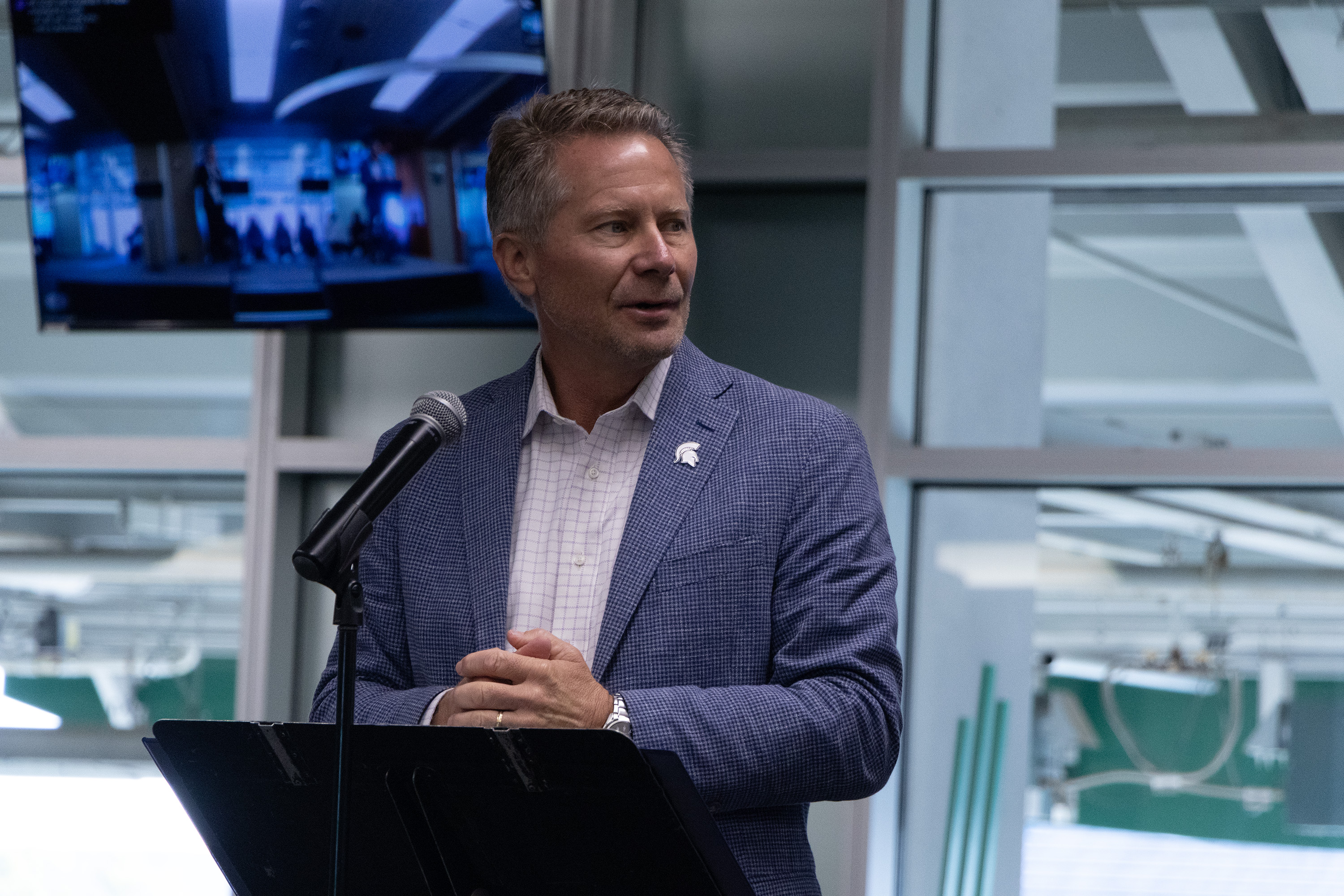 MSU President Kevin M. Guskiewicz speaks at the podium at the 2024 Student Success Launch.