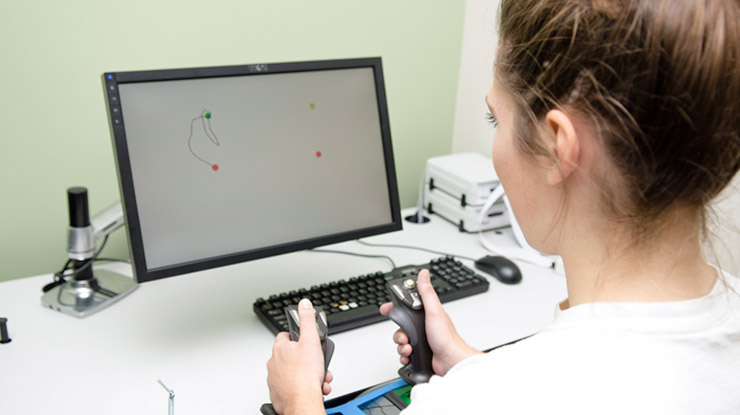 A kinesiology major uses technology for the study of physical activity and its impact on health, society and life quality.