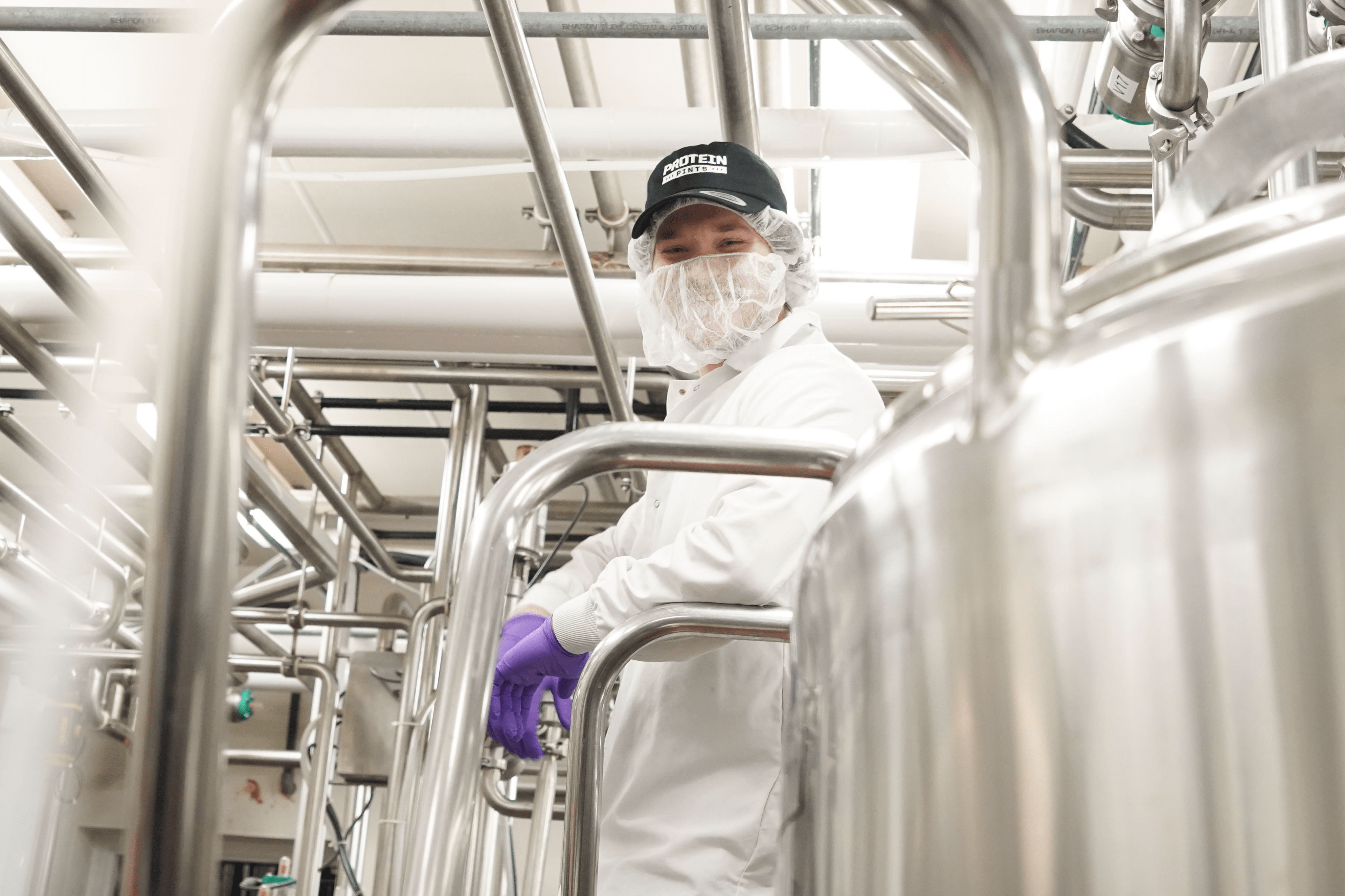 Man smiling in production factory