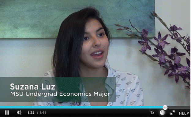 A female economics student in a video interview.