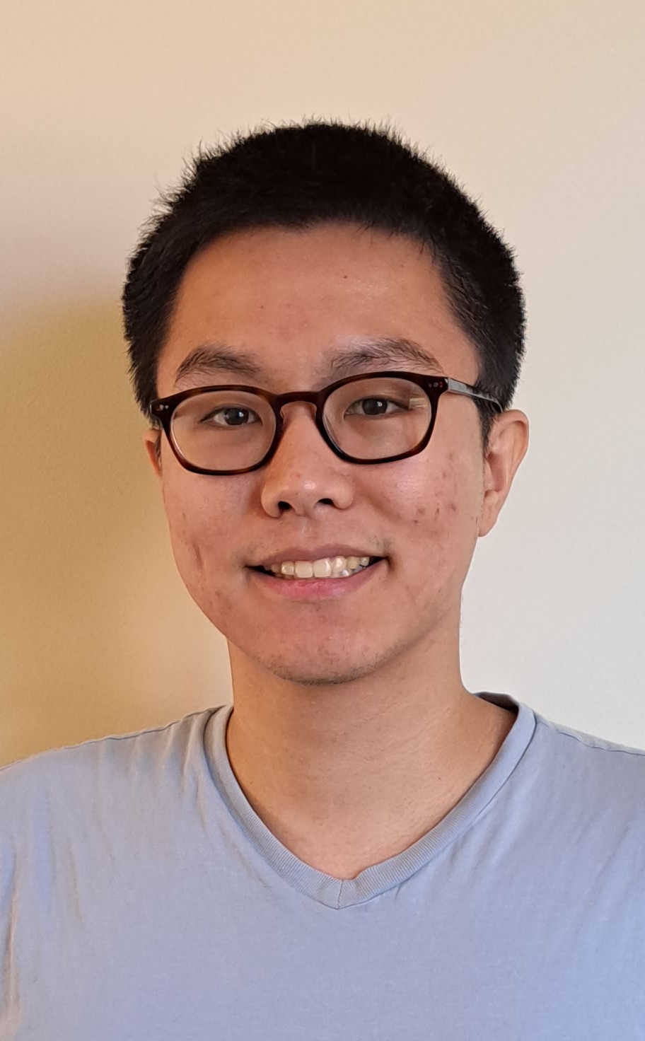 Headshot of Kevin Mi.