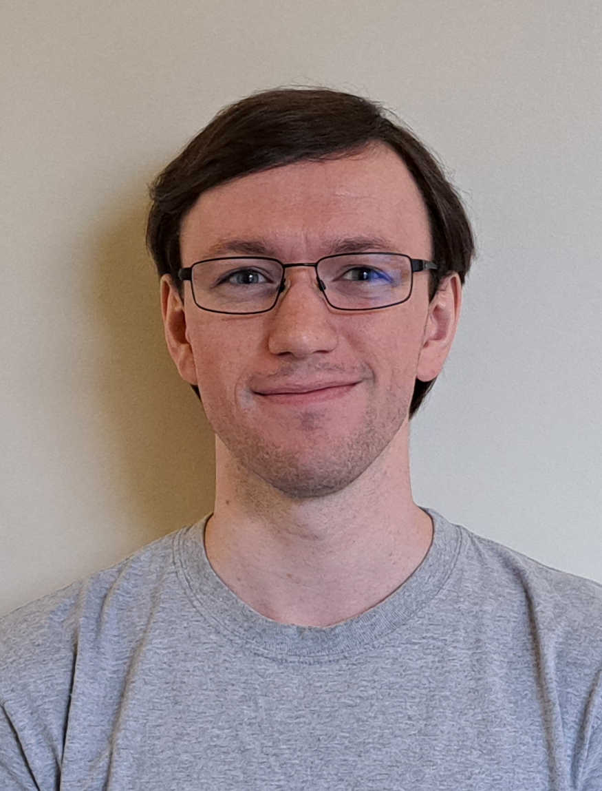 Headshot of Justin Farmer. 