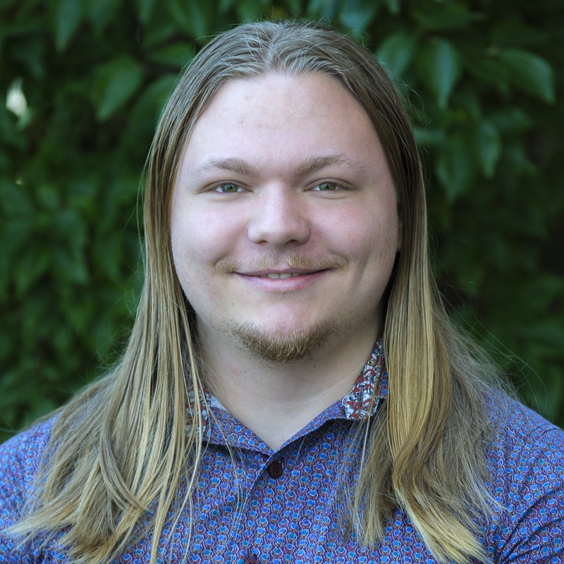 Headshot of Logan Stewart.