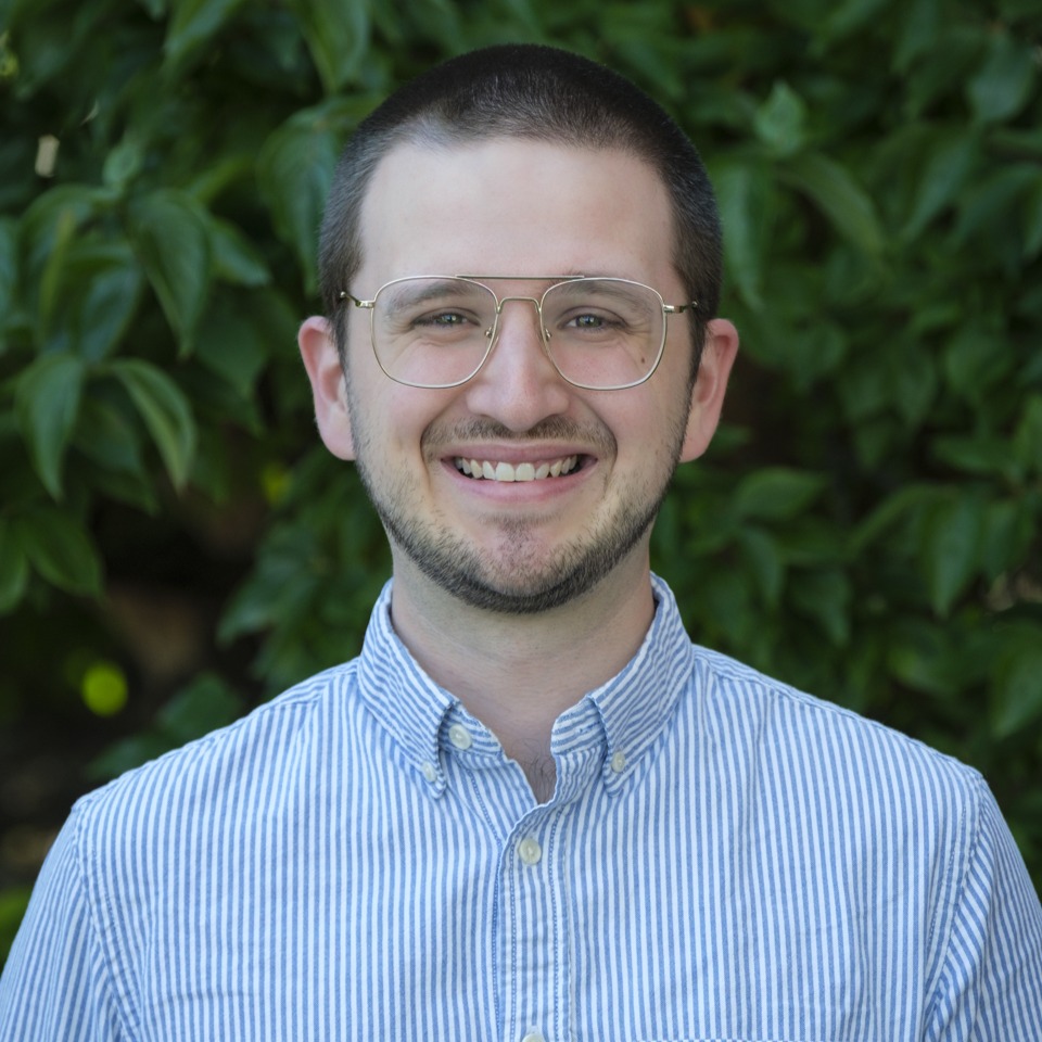 Headshot of Tyler Powell.