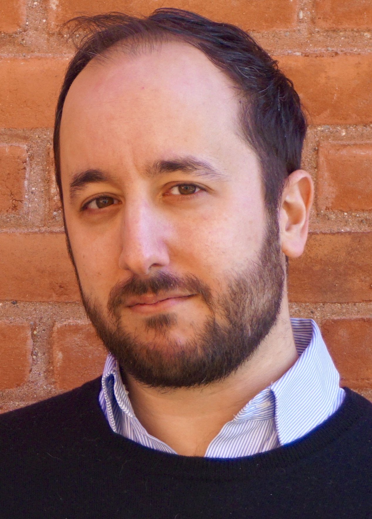 Headshot of Oren Ziv.