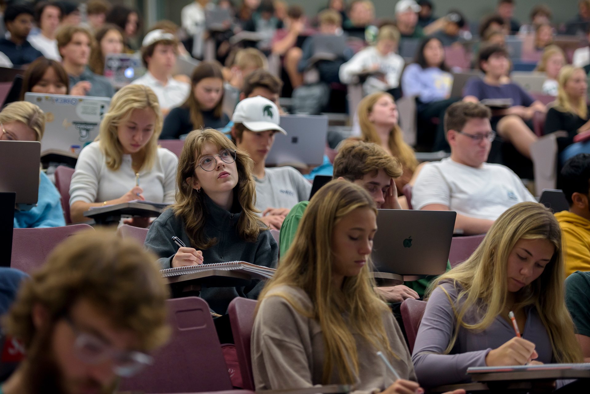 Students in a lecture hall.