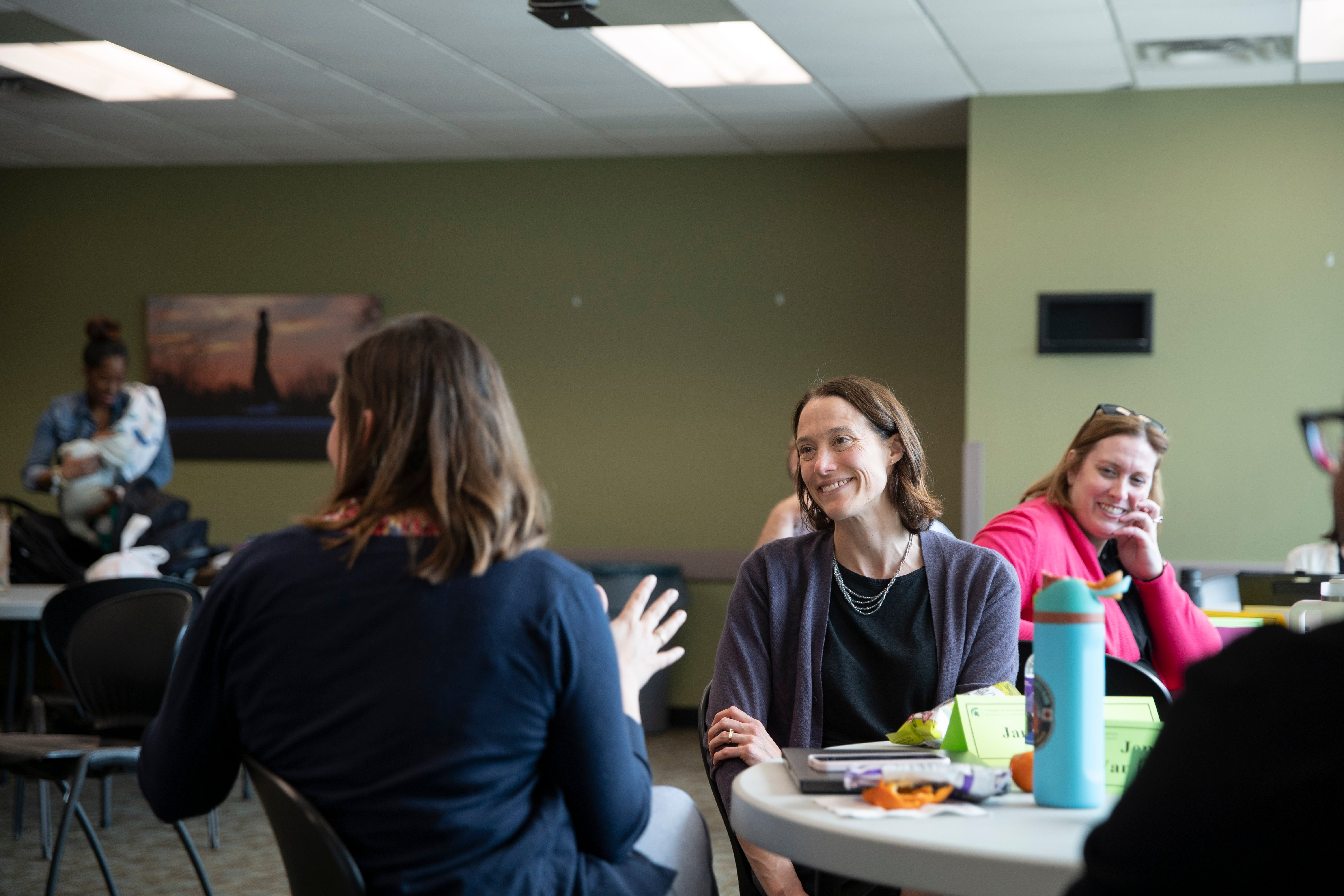 Jana Aupperlee listens during a meeting.
