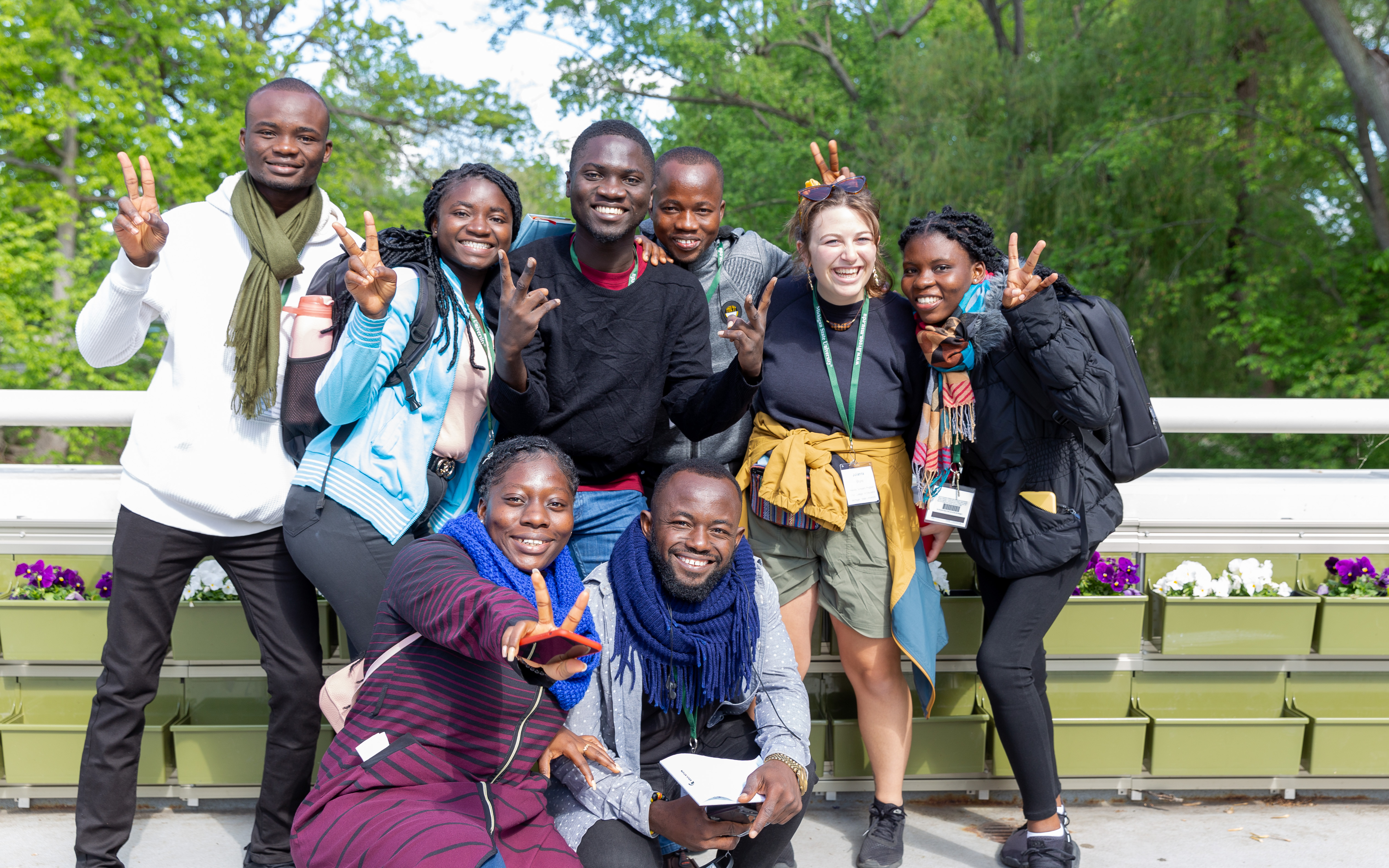 Group of Spartans and scholars from Ghana pose for a photo on MSU's campus. 