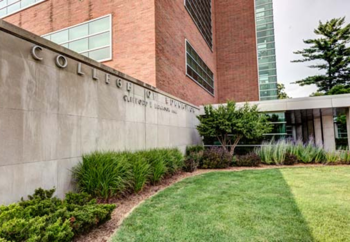 Close up of College of Education sign on Erickson Hall
