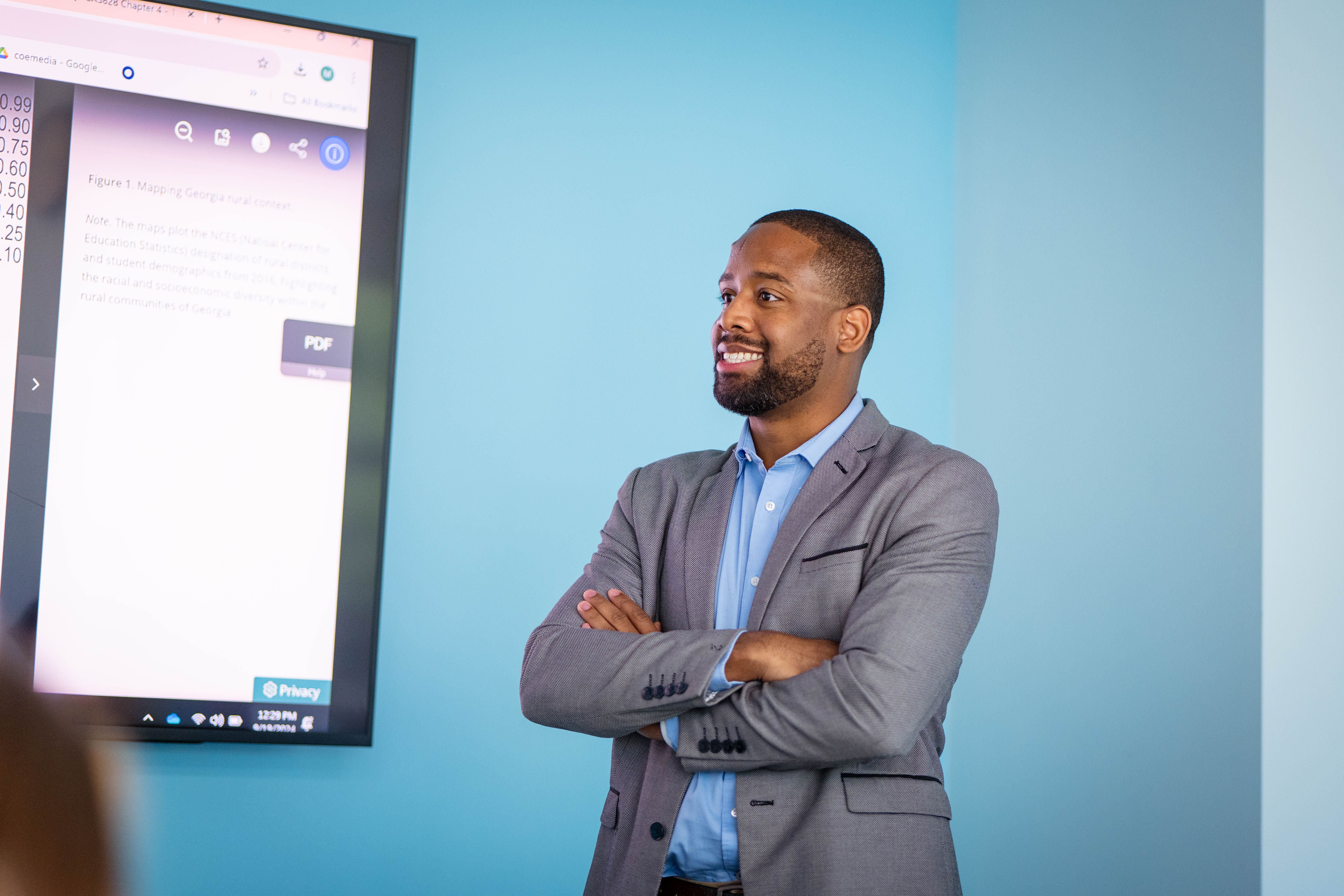Jerome Graham smiles while leading a class session