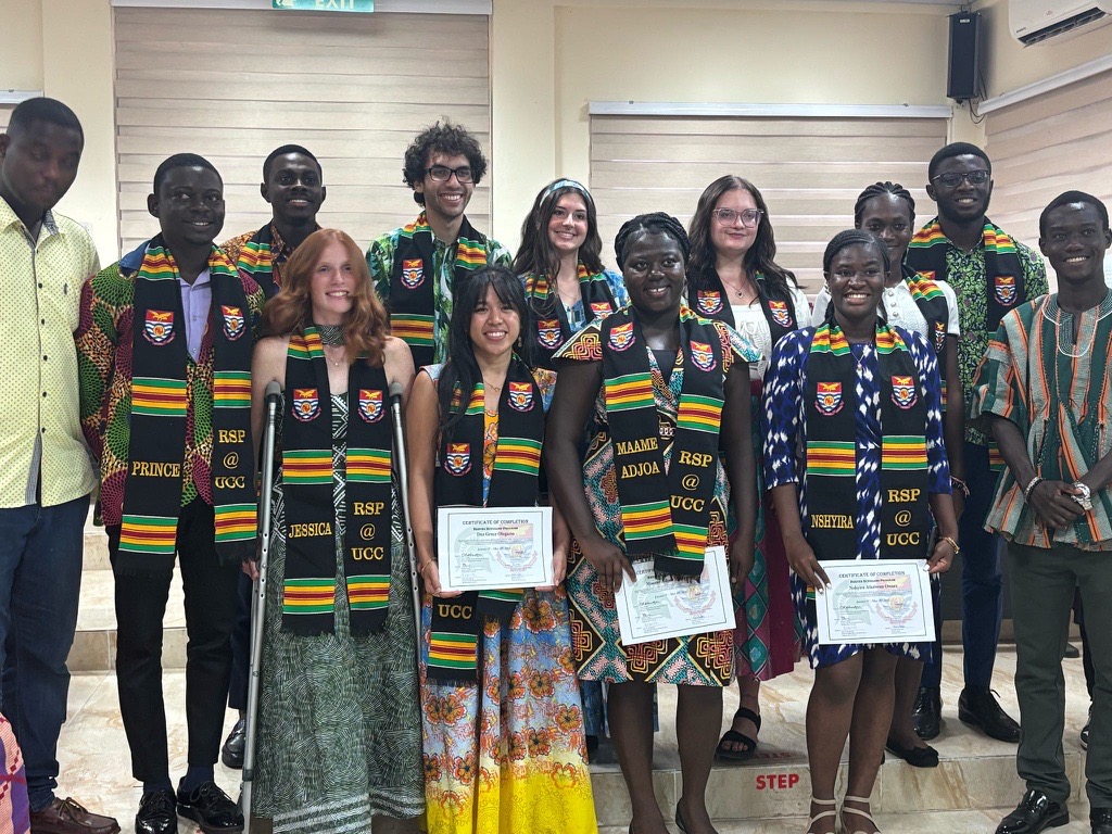 group of students wearing grad robes