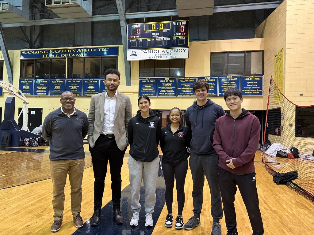 ypaw research team posing for a photo in a gym