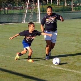 Moreno-Raysin plays soccer with youth