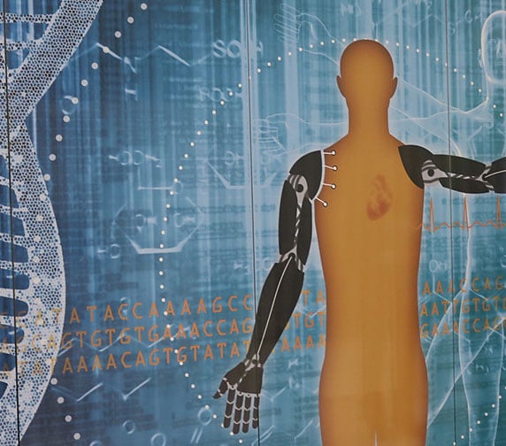 Graphic of a human figure with a dna strained next to him