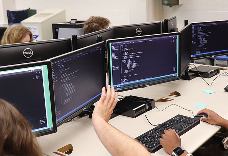 Students working on computers during the MGIT camp