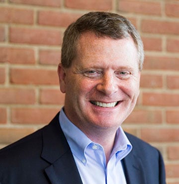 Professional headshot of Michael K.J. Milligan