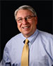 Professional headshot of Jim Susan